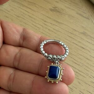 Elegant Silver and Gold Ring with Blue Stone